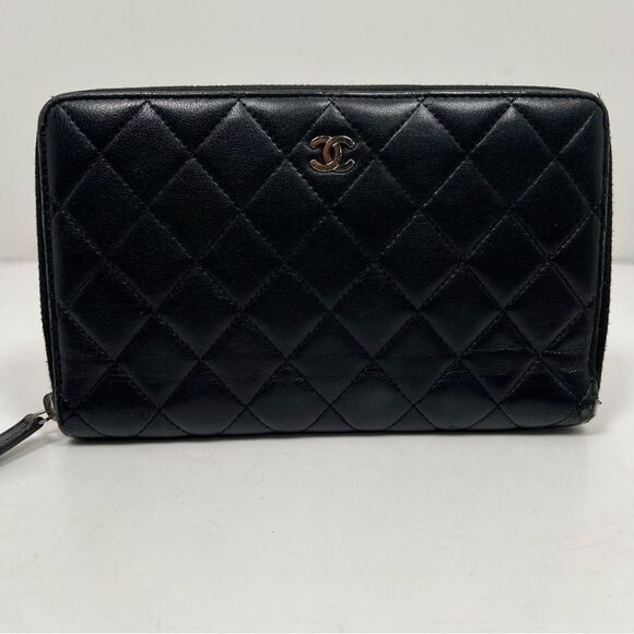 CHANEL Handbags - CHANEL Classic Zip Around Wallet Black Quilted lamb skin